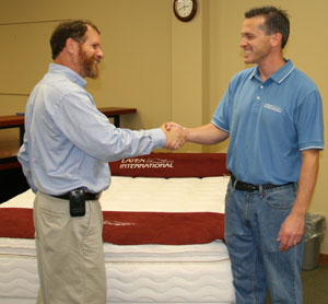 VP Kevin cogratulates Dave on making a great mattress