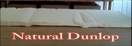 Dunlop latex takes a set and does not spring back.