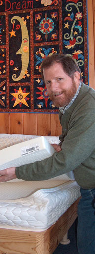 dave show how latex mattress firmness can be changed for one sleeper