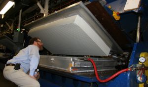 Dave inspects Talalay Latex Core coming out of mold