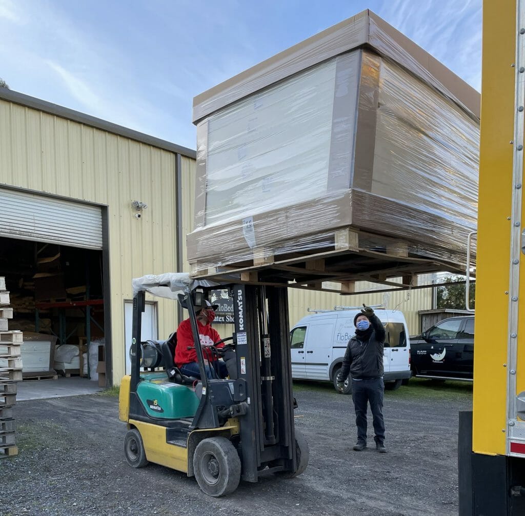 Russ and Paul unload emegency truck load of Talalay